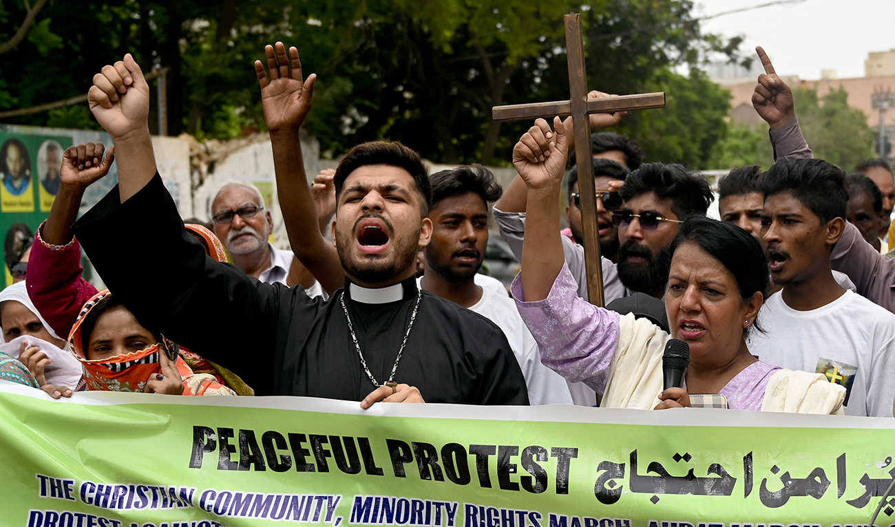 Pakistan minority rights campaigners protest the sentencing of a Christian man to death for sharing an allegedly blasphemous TikTok post, in Karachi on July 2, 2024. (AFP)