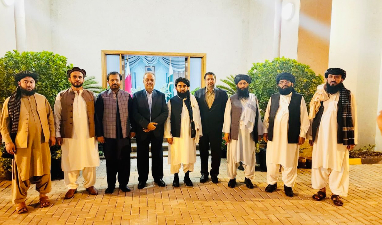 Afghan Taliban delegation, Pakistani diplomats pose for a group photo on sidelines of United Nations-sponsored talks in Doha, Qatar on July 2, 2024. — (X/@AsifDurrani20)
