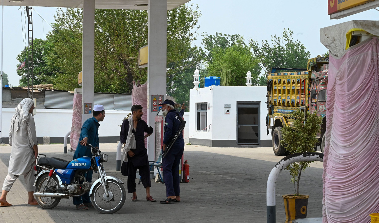 A motorist visits a petrol pump amidst a nationwide strike in Pakistan to protest against the hike in tax on July 5, 2024. (AFP)