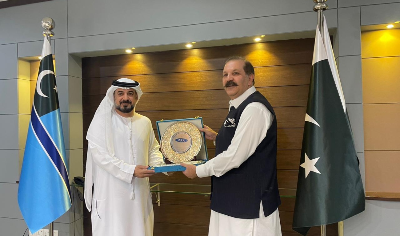 United Arab Emirates General Civil Aviation Authority director, Abdullah Al Kaabi (left), receives a souvenir from an official of Pakistan Civil Aviation Authority in Karachi, Pakistan on July 5, 2024. (Pakistan Civil Aviation Authority)