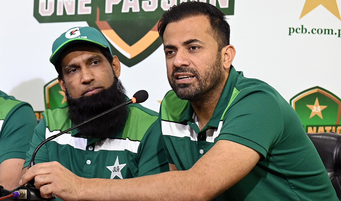 Former selector for Pakistan’s cricket team Wahab Riaz (R) speaks during a press conference in Lahore on May 2, 2024. (AFP/File)