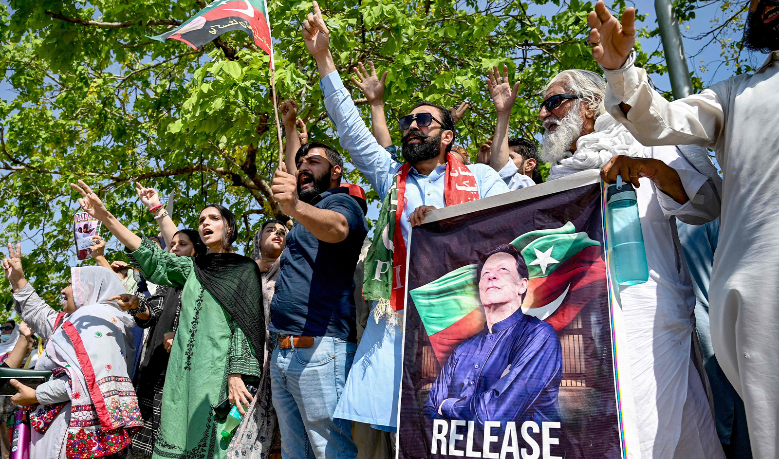 Supporters of Pakistan's former prime minister and Pakistan Tehreek-e-Insaaf (PTI) party leader Imran Khan, celebrate after a court verdict overturned his illegal marriage conviction, outside the court building in Islamabad on July 13, 2024. (AFP/File)