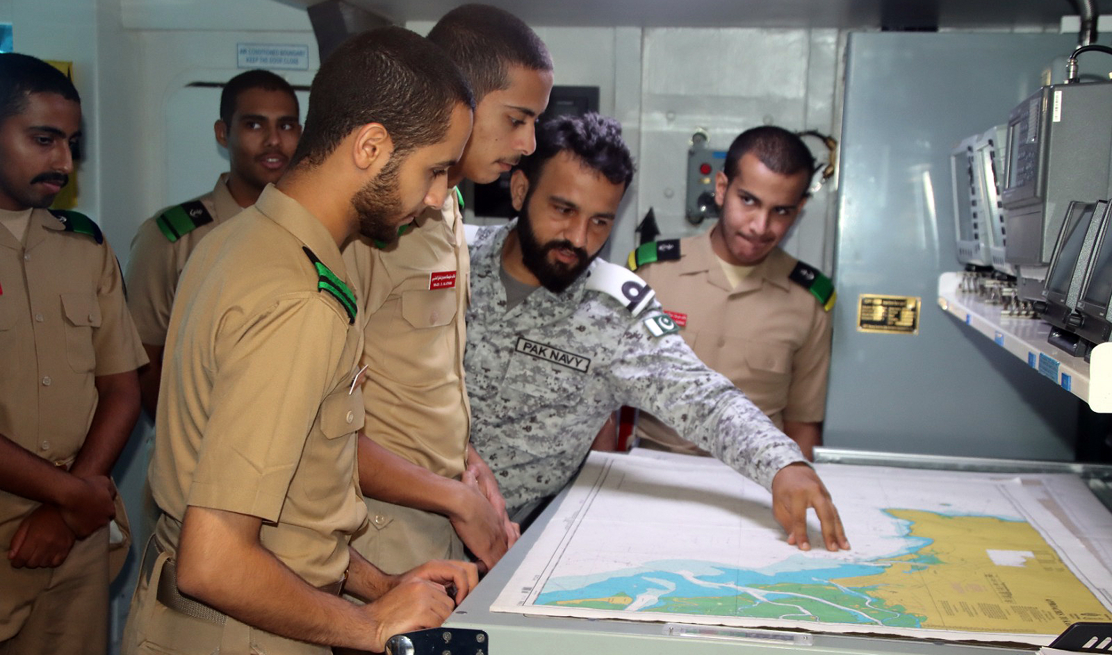 The picture shared by the Pakistan Navy on July 16, 2024, shows a Pakistan Navy officer giving training to Royal Saudi Naval Forces (RSNF) trainees from the King Fahad Naval Academy. (Pakistan Navy)