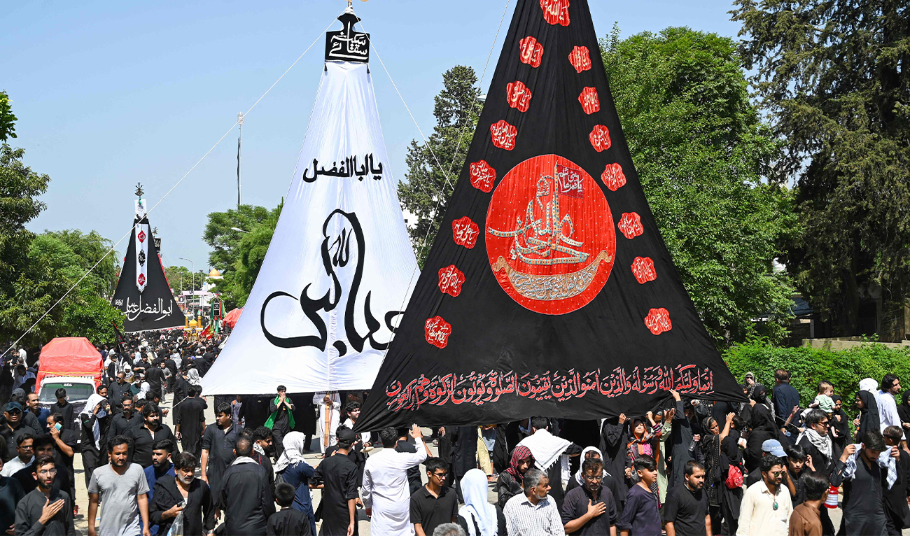 Shiite Muslims march in a religious procession on the ninth day of the Islamic month of Muharram, in Islamabad on July 16, 2024. (AFP)