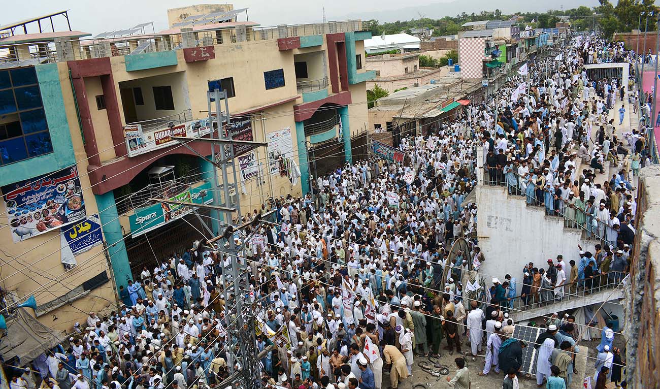 Residents take part in a peace rally to protest after the recent suicide attack by militants on an army enclave in Bannu, on July 19, 2024. (AFP)