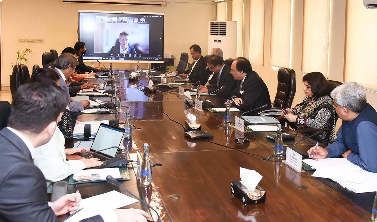 Pakistan’s finance minister, Muhammad Aurangzeb, holds a virtual meeting with representatives of Fitch Ratings agency, on July 22, 2024. (Government of Pakistan)