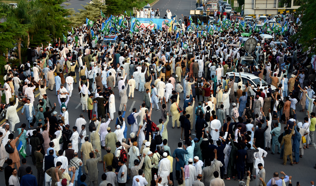 Supporters of the Pakistani religious group “Jamaat-e-Islami” chant anti-government slogans during a protest against the price hike and additional taxes and increasing electricity and gas tariffs, in Islamabad on July 26, 2024. (AP)