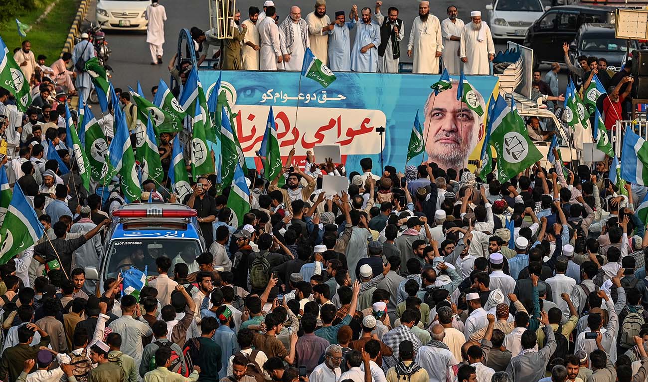 Activists and supporters of the Jamaat-e-Islami (JI) party take part in a demonstration against the country's rising inflation in Islamabad on July 26, 2024. (AFP)