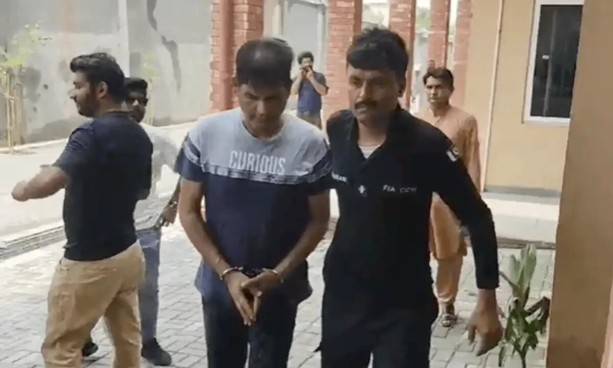 Ahmed Waqas Janjua, Ahmed Waqas Janjua, international media coordinator of former prime minister Imran Khan’s party, being escorted to court by the police on July 30, 2024 in Islamabad, Pakistan. (Photo courtesy: @sayedzbukhari/ X)