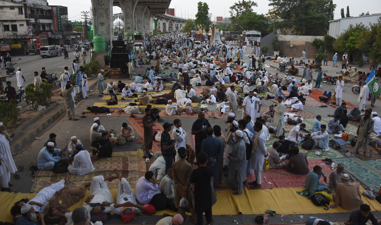 Supporters of the Pakistani religious political party “Jamaat-e-Islami” sit during a protest in the city of Rawalpindi on July 27, 2024. (AP)