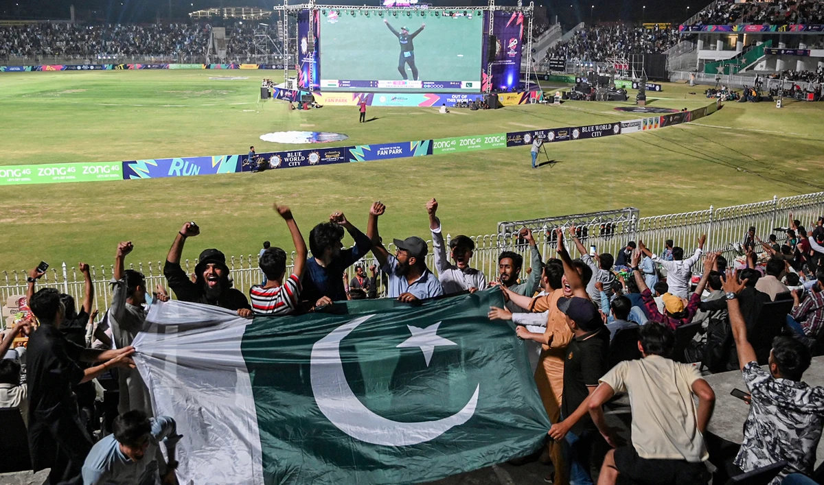 In this file photograph, taken on June 9, 2024, cricket fans react after a dismissal as they watch a live telecast at the Rawalpindi Cricket Stadium in Rawalpindi. (AFP/File)