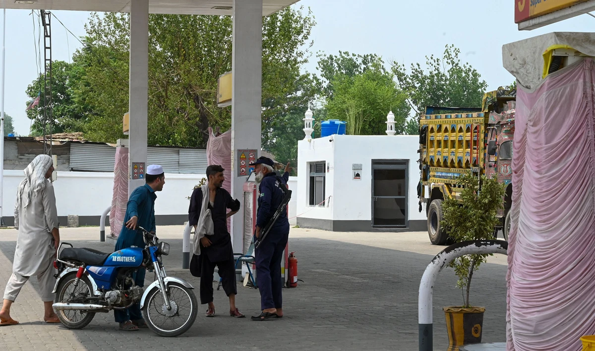 A motorist visits a petrol pump amidst a nationwide strike in Pakistan to protest against the hike in tax on July 5, 2024. (AFP)