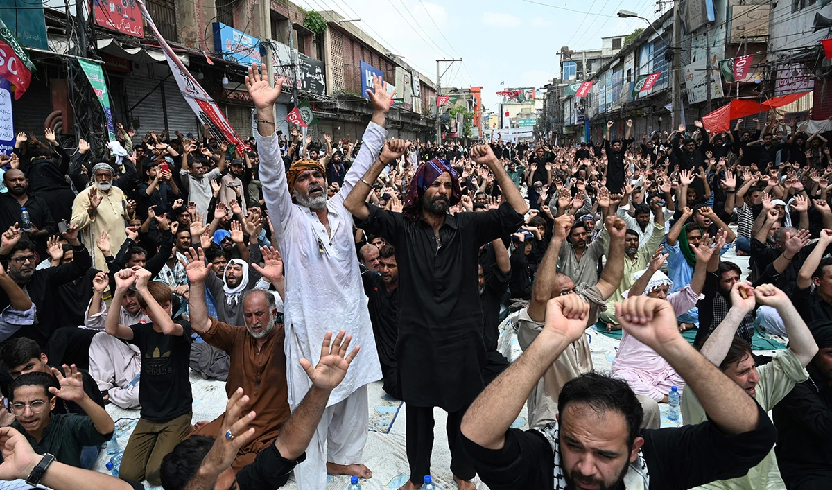 Shiite Muslims chant slogans during a procession on the tenth day of Ashura in the first Islamic month of Muharram, commemorating the seventh century killing of Prophet Mohammed's grandson Imam Hussein, in Rawalpindi on August 9, 2022. (AFP/File)
