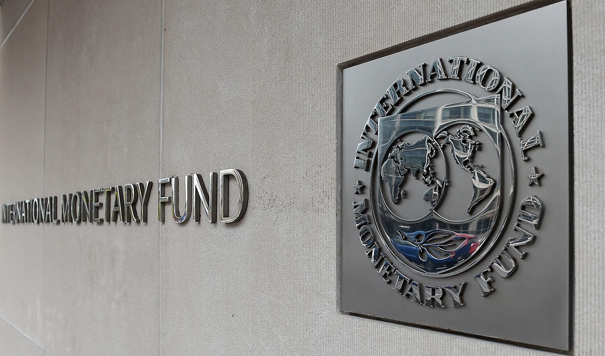 An exterior view of the building of the International Monetary Fund (IMF), with the IMG logo, is seen on March 27, 2020 in Washington, DC. (AFP/File)