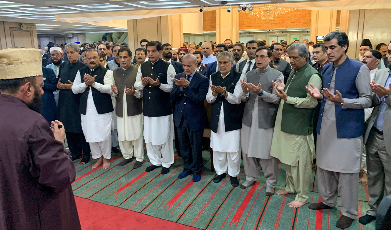 Pakistan's Prime Minister Shehbaz Sharif (C) offers funeral prayers in absentia for assassinated Hamas leader Ismail Haniyeh in Tehran, at the Parliament House in Islamabad on August 2, 2024. (AFP)