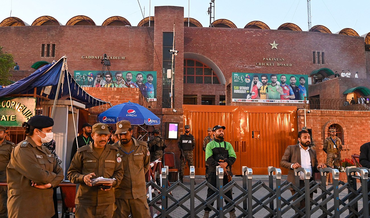 Policemen stand guard outside the Gaddafi Cricket Stadium during the Pakistan Super League (PSL) Twenty20 cricket final match between Multan Sultans and Lahore Qalandars, in Lahore on March 18, 2023. (AFP/File)