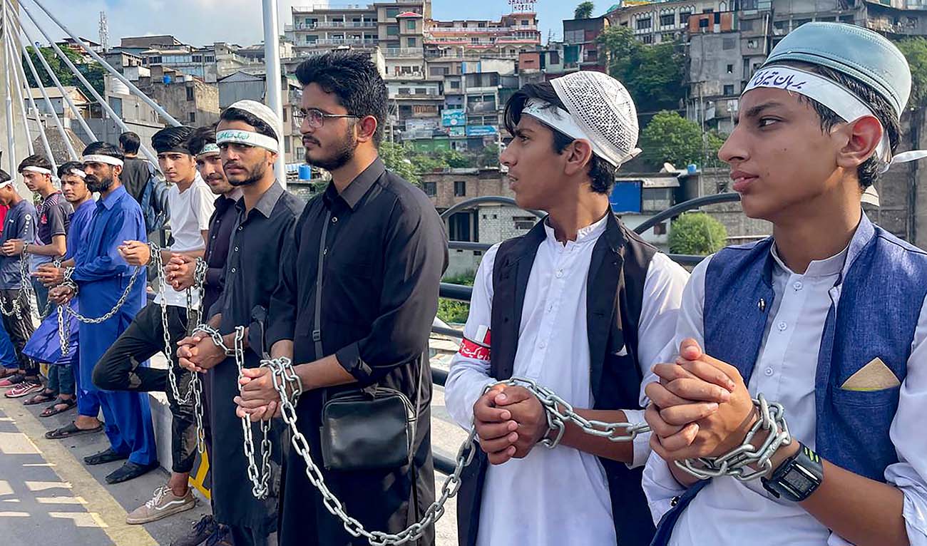 Kashmiri demonstrators protest the abrogation of the special status of Jammu and Kashmir by the Indian government on its fifth anniversary, at Muzaffarabad, capital of Pakistan-administered Kashmir on August 5, 2024. (AFP)