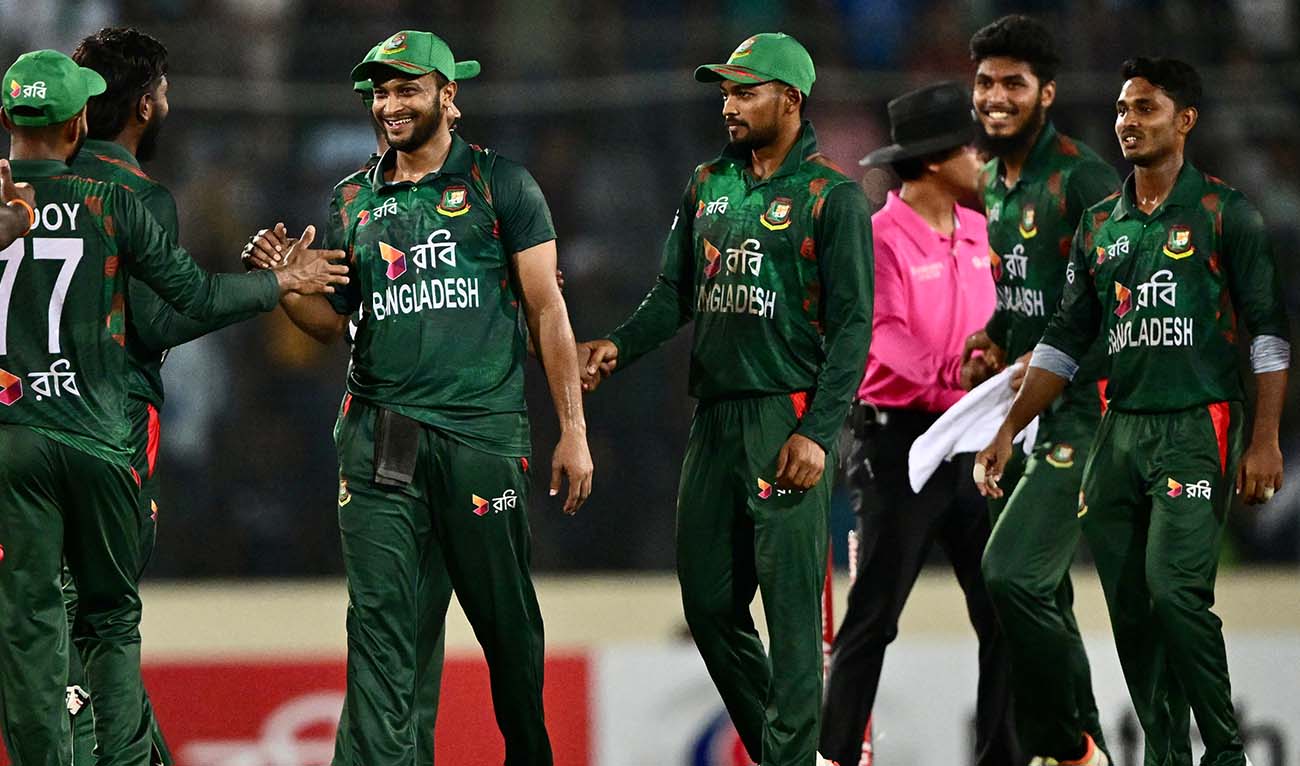 Bangladesh’s team celebrates their win against Zimbabwe at the fourth Twenty20 international cricket match in Sher-e-Bangla National Cricket Stadium of Dhaka on May 10, 2024. (AFP/File)