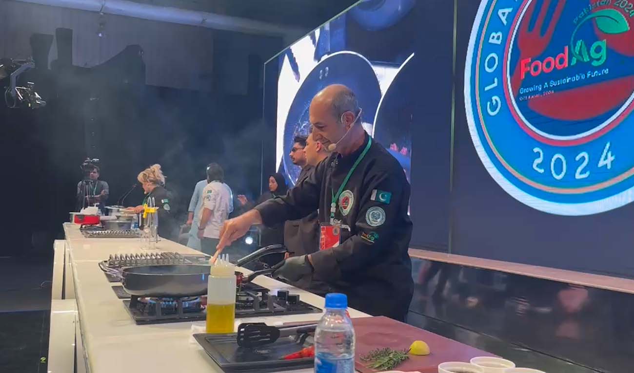 Pakistani chefs prepare food at the Global Cuisine Show in Karachi on August 9, 2024. (AN Photo)