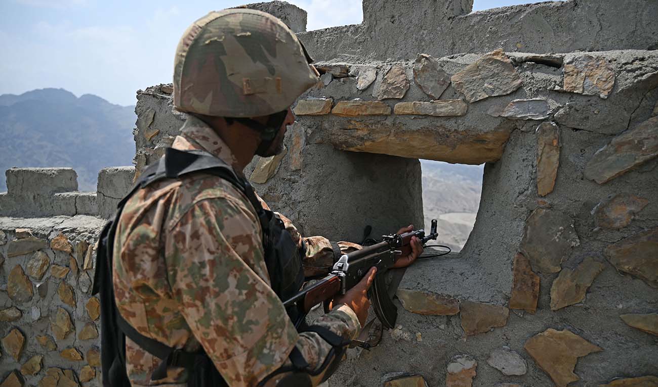 A Pakistani army soldier mans a position at the Pakistan-Afghanistan border near Big Ben post in Khyber district in Khyber Pakhtunkhwa province August 3, 2021. (AFP/File)