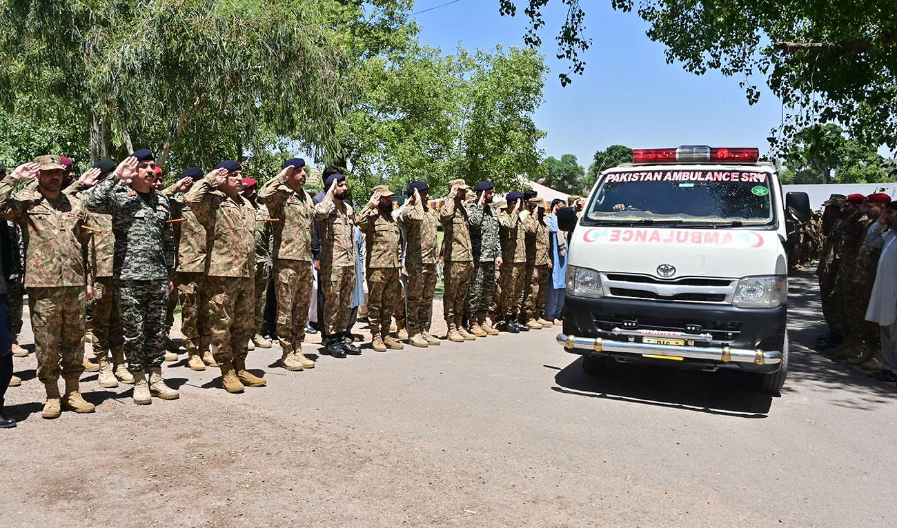 In this file photograph, taken and released by Pakistan’s Inter-Service Public Relations (ISPR), military personnel attend funeral prayers for two army officials who were killed in a shootout with militants in Peshawar District on May 26, 2024. (Photo courtesy: ISPR)