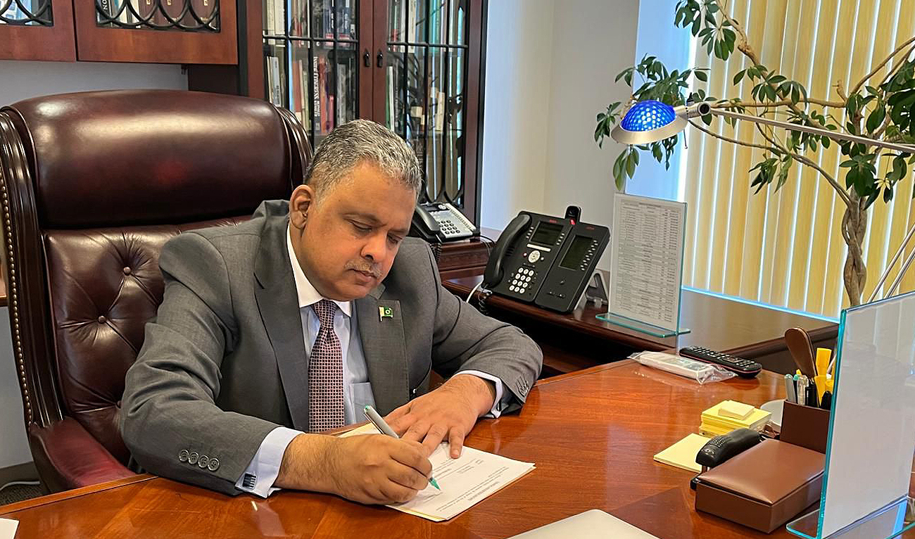 In this handout photograph, taken and released by Pakistan’s embassy in Washington on August 22, 2024, Ambassador Rizwan Saeed Sheikh assumes office as Pakistan’s envoy to the United States. (Photo courtesy: Pakistan embassy)