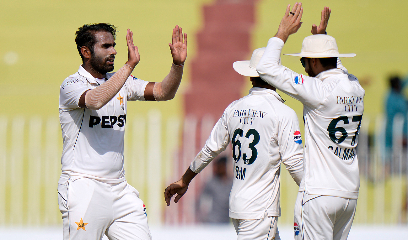 Pakistan’s Mohammad Ali, left, celebrates after taking the wicket of Bangladesh’s Shadman Islam during the third day of first cricket test match between Pakistan and Bangladesh, in Rawalpindi on August 23, 2024. (AP)