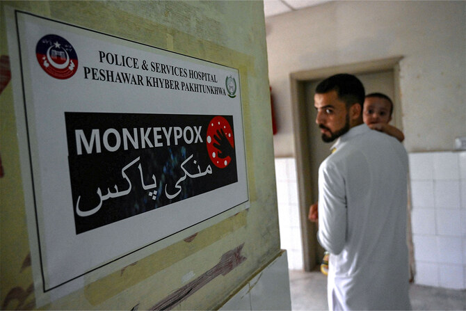 A poster indicating an isolation ward, prepared for mpox patients, is seen at the Police and Services hospital in Peshawar on August 20, 2024. (AFP)