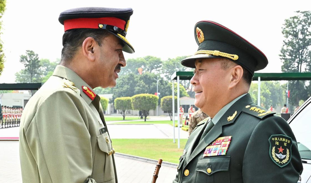 General Li Qiaoming (L), the ground force commander of the Chinese People's Liberation Army, sakes hands with Pakistan Army Chief General Asim Munir on August 26, 2024, in Rawalpindi, Pakistan. (Photo courtesy: Military's media wing)