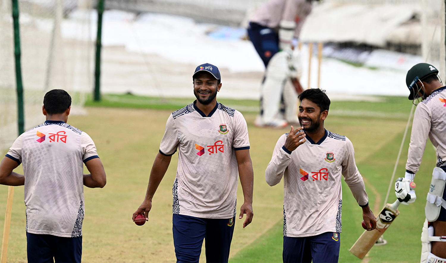 Bangladesh's Shakib Al Hasan (2L) and Mehidy Hasan Miraz (2R) attend a training session at the Rawalpindi Cricket Stadium in Rawalpindi on August 28, 2024, ahead of their second and last cricket Test match against Pakistan. (AFP)
