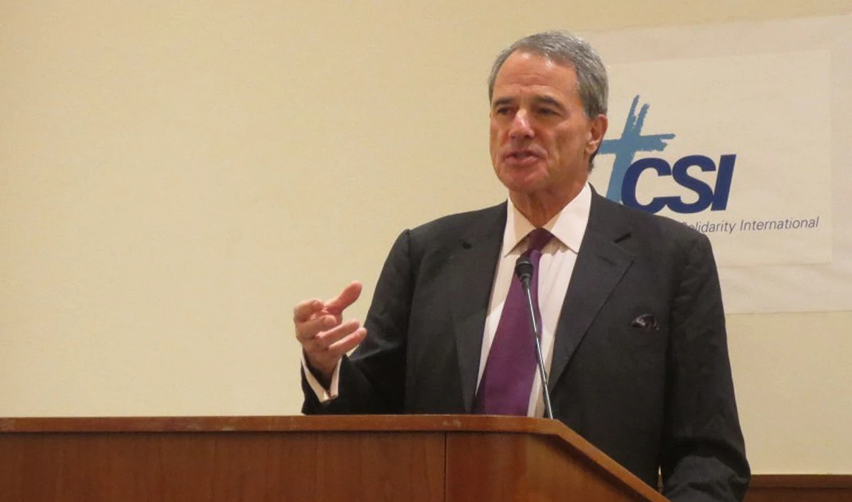 In this file photograph, taken and released by Christian Solidarity International on October 22, 2015, British-American journalist Charles Glass speaks during an event in Boston. (Photo courtesy: CSI/File)