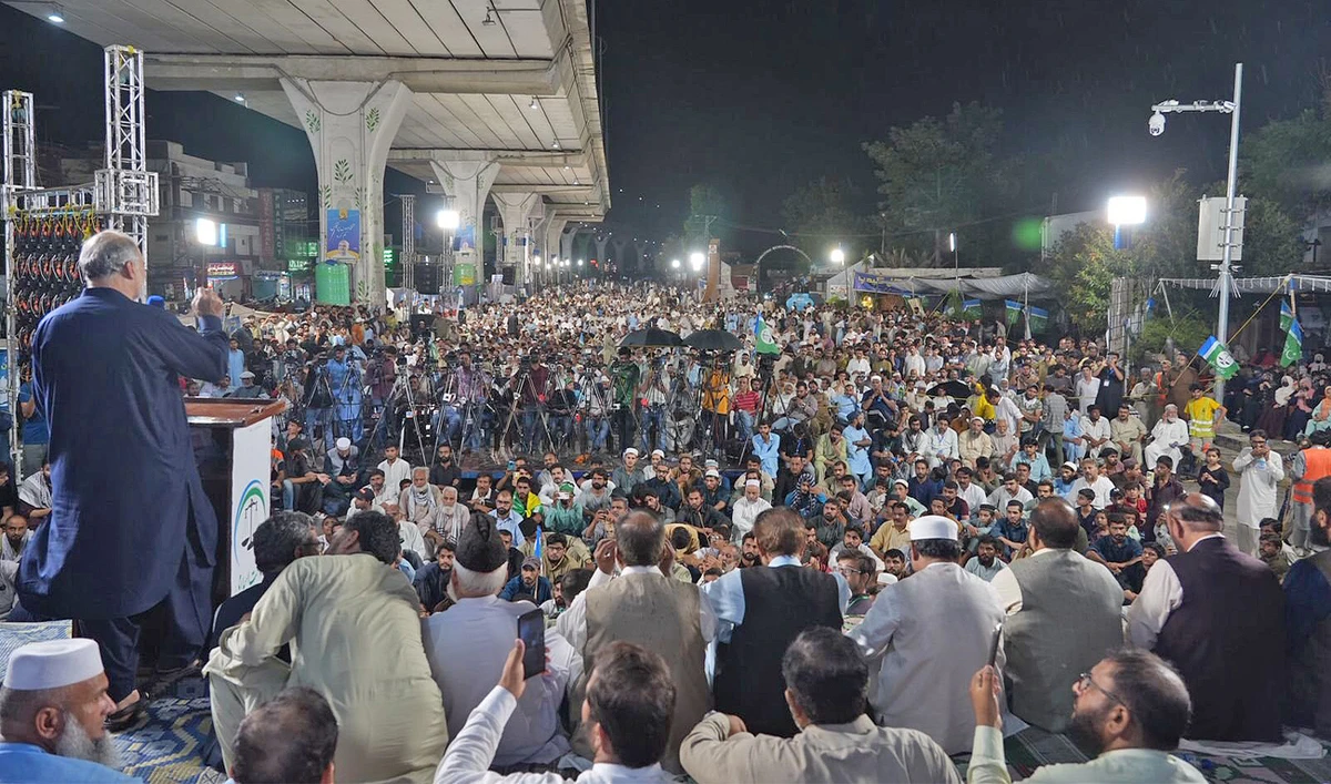 Jamaat-e-Islami (JI) party chief, Hafiz Naeem-ur-Rehman (left), is addressing party activists and supporters in a demonstration against the country's rising inflation in Rawalpindi on August 7, 2024. (@JIPOfficial/X)