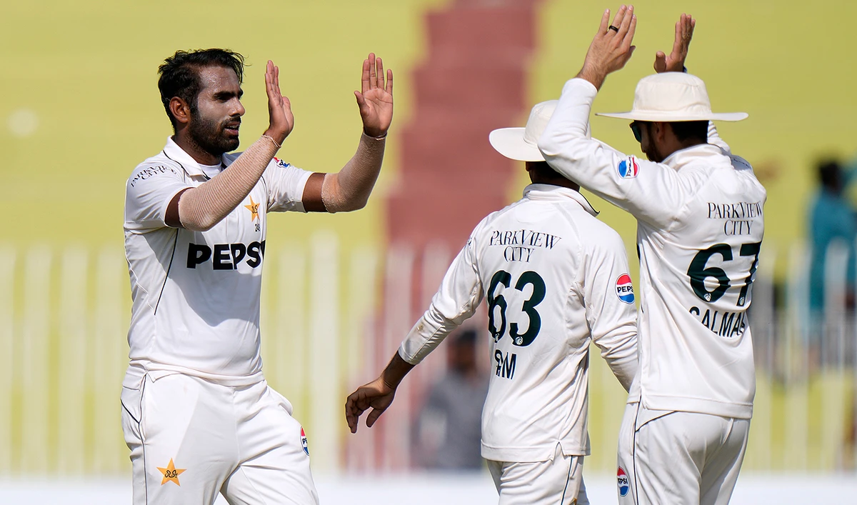 Pakistan’s Mohammad Ali, left, celebrates after taking the wicket of Bangladesh’s Shadman Islam during the third day of first cricket test match between Pakistan and Bangladesh, in Rawalpindi on August 23, 2024. (AP)