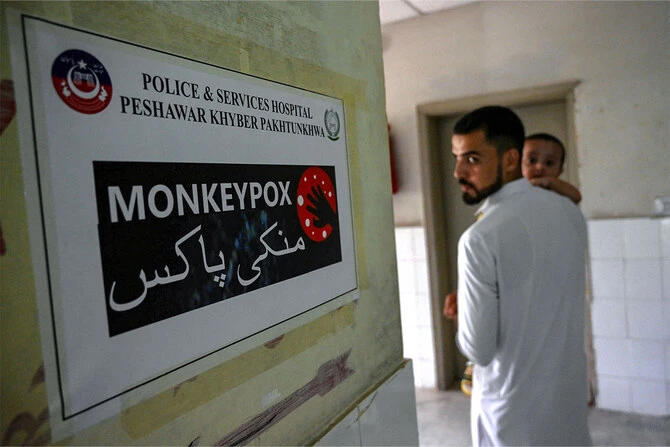 A poster indicating an isolation ward, prepared for mpox patients, is seen at the Police and Services hospital in Peshawar on August 20, 2024. (AFP)