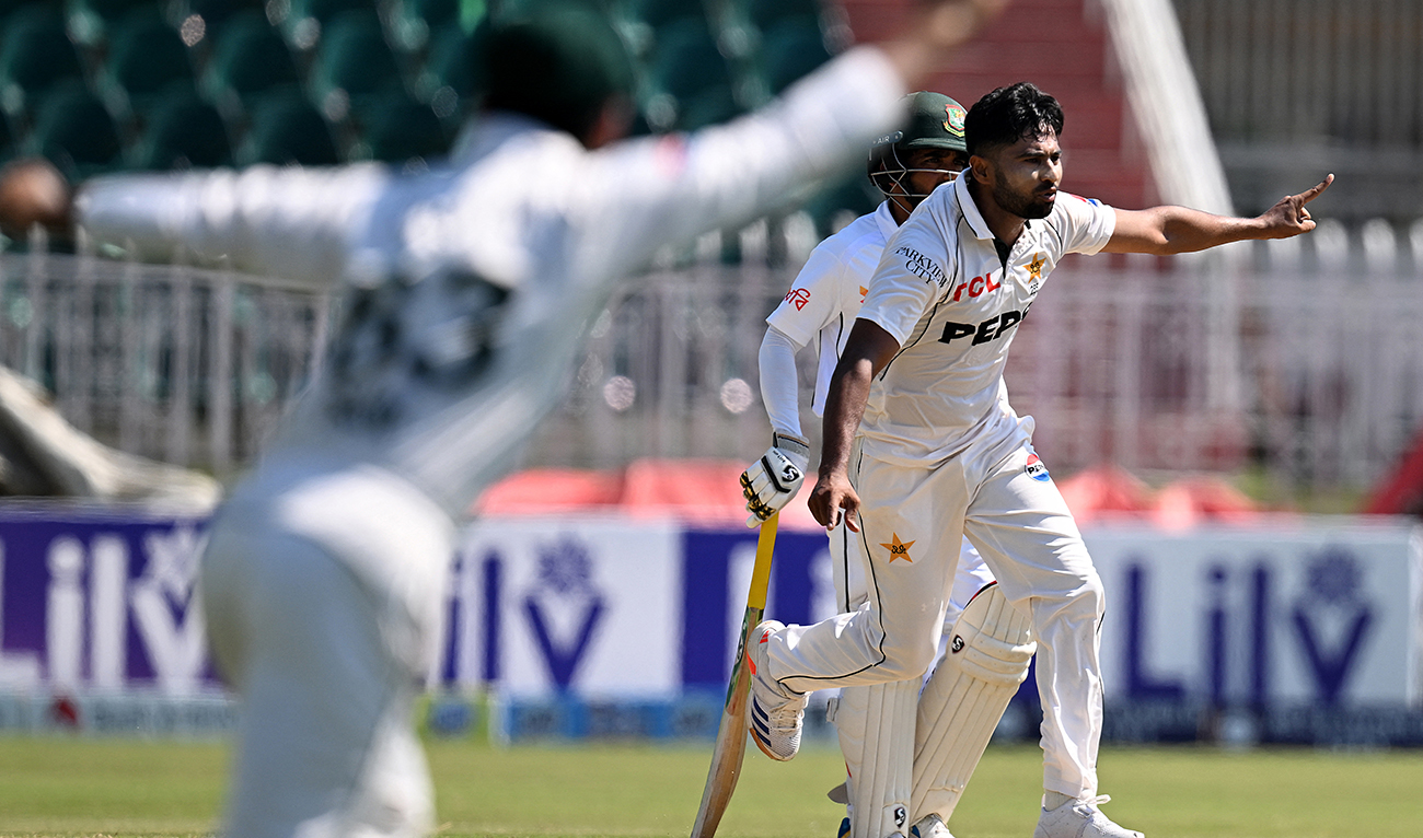 Pakistan's Khurram Shahzad (R) celebrates after taking the wicket of Bangladesh's captain Najmul Hossain Shanto during the third day of the second and last Test cricket match between Pakistan and Bangladesh, at the Rawalpindi Cricket Stadium in Rawalpindi on September 1, 2024. (AFP)