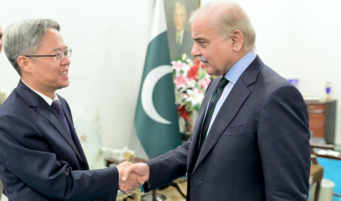 Prime Minister Shehbaz Sharif shakes hands with the Chinese envoy, Jiang Zaidong, in Islamabad, Pakistan on September 2, 2024. (Photo courtesy: PMO)