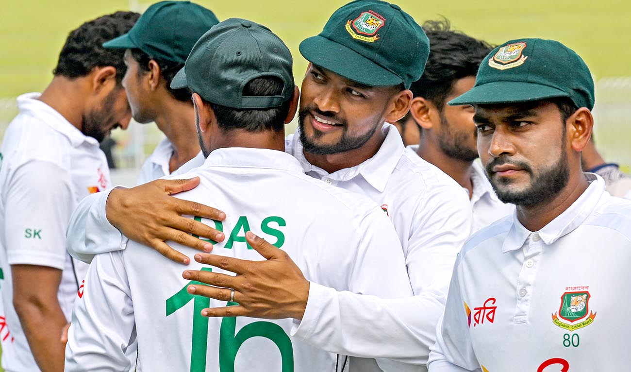 Bangladesh's captain Najmul Hossain Shanto (2R) celebrates with teammates after their win at the second and last Test cricket match against Pakistan, in the Rawalpindi Cricket Stadium of Rawalpindi on September 3, 2024. (AFP)