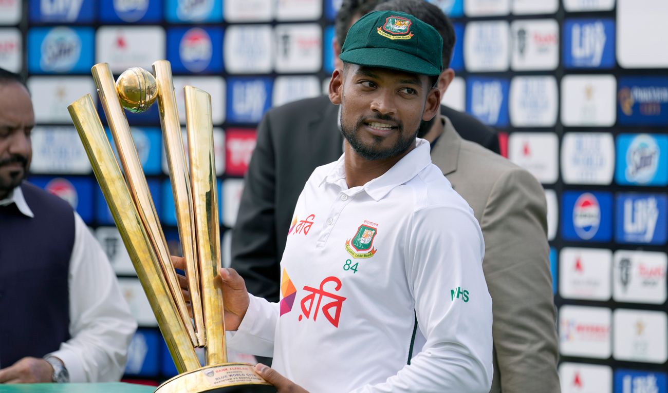 Bangladesh’s Najmul Hossain Shanto holds trophy after winning the test cricket series against Pakistan at a ceremony, in Rawalpindi on September 3, 2024. (AP)