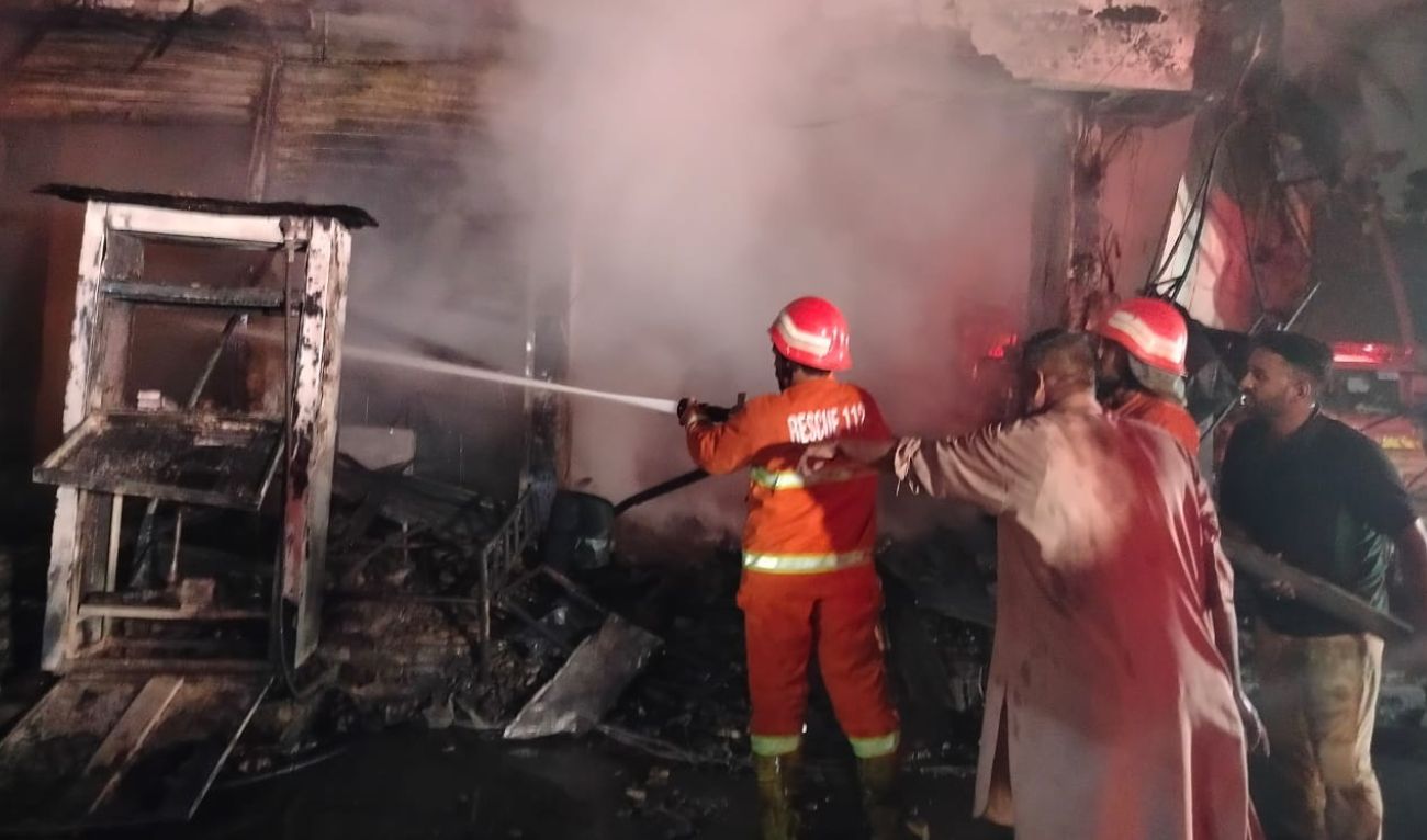Firefighters try to extinguish a fire that broke out at a residential building in Karachi, Pakistan, on September 11, 2024. (Photo courtesy: Rescue 1122)