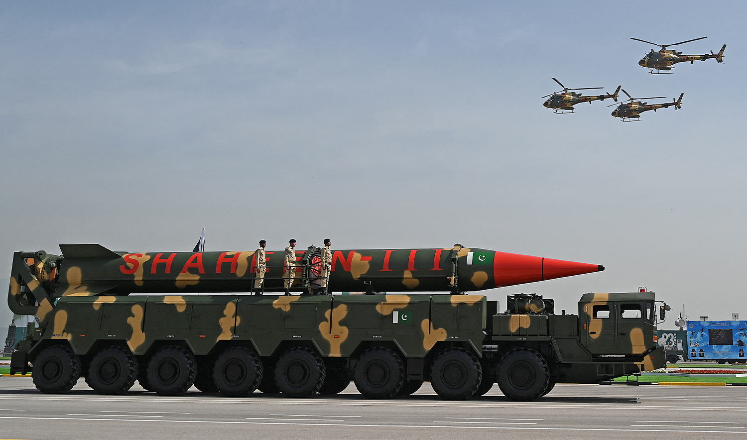 Pakistani military helicopters fly past a vehicle carrying a long-range ballistic Shaheen III missile take part in a military parade to mark Pakistan's National Day in Islamabad on March 25, 2021. (AFP/File)
