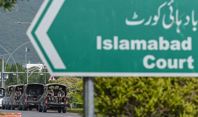 A convoy of Pakistani army passes the Islamabad High Court building in Islamabad on August 29, 2023. (AFP/File)