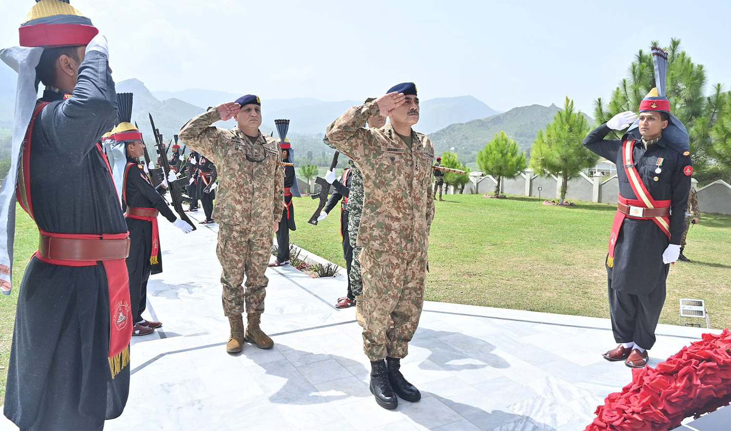 Chief of Army Staff General Asim Munir (center) lays floral wreath at the Martyrs’ Memorial during a visit to the Orakzai tribal district, Pakistan, on September 13, 2024. (ISPR)