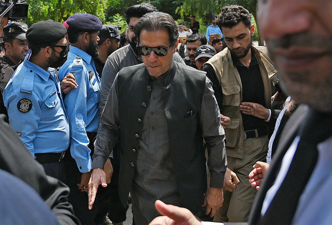 Pakistan's former Prime Minister Imran Khan (C) leaves after appearing before the High Court in Islamabad, Pakistan, on August 31, 2022. (AFP/File)