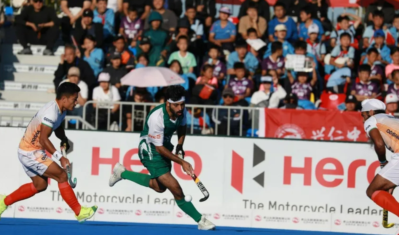 Pakistan’s defender #8 Rana Waheed Ashraf is marked by Indian players in final pool match of Asian Hockey Champions Trophy in Hulunbuir, China on September 14, 2024. (Photo courtesy: International Hockey Federation)