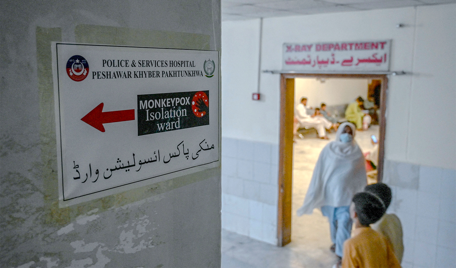A poster indicating an isolation ward, prepared for mpox patients, is seen at the Police and Services hospital in Peshawar on August 20, 2024. (AFP/File)