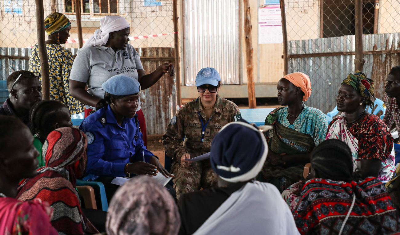 Displaced women speak to UN Mission Peacekeepers from Pakistan Army in a displacement camp in Juba, South Sudan on September 13, 2024. (Photo courtesy: UNMISS)
