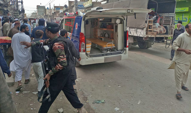 In this file photo, taken on November 3, 2023, Pakistan’s security personnel make way for an ambulance after a blast in Dera Ismail Khan, Pakistan. (Rescue 1122/File)