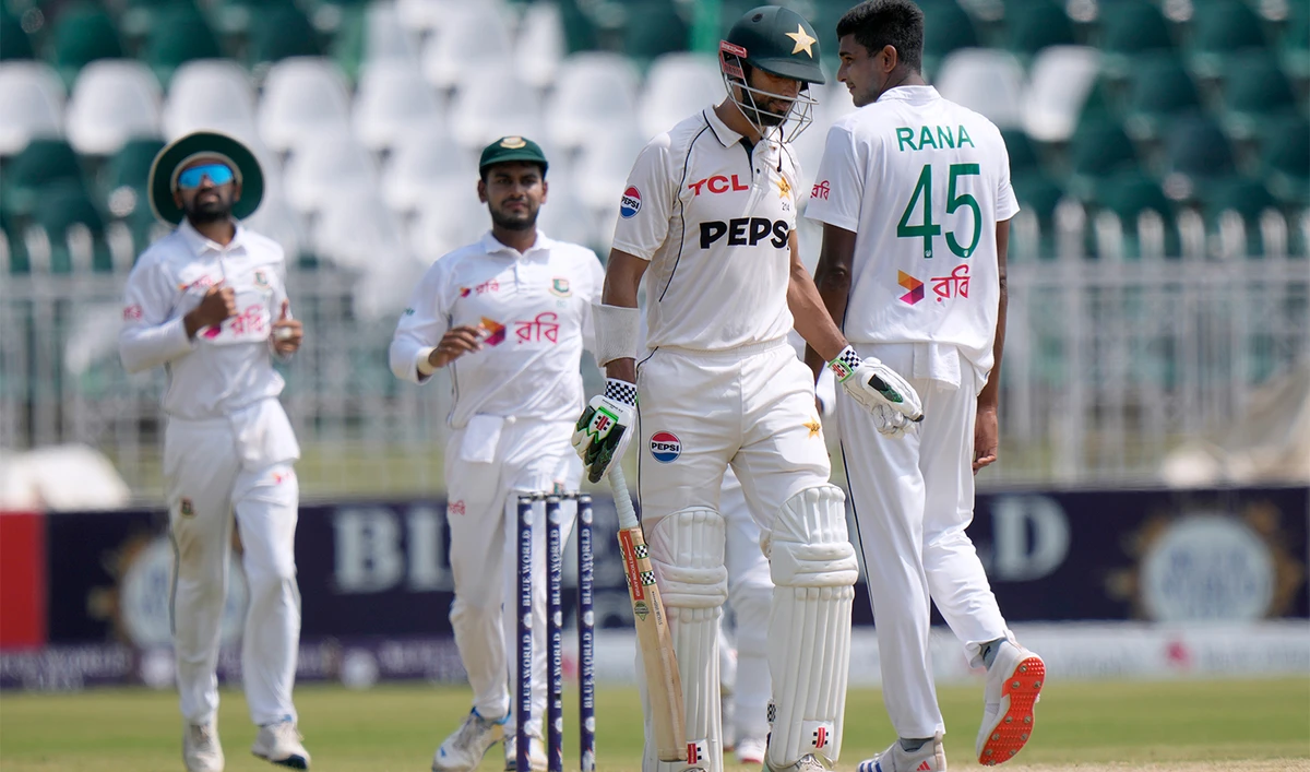 Pakistan's Shan Masood, second right, reacts as Bangladesh's Nahid Rana, right, celebrates after his dismissal during the fourth day of second test cricket match between Pakistan and Bangladesh, in Rawalpindi, Pakistan, on September 2, 2024. (AP)