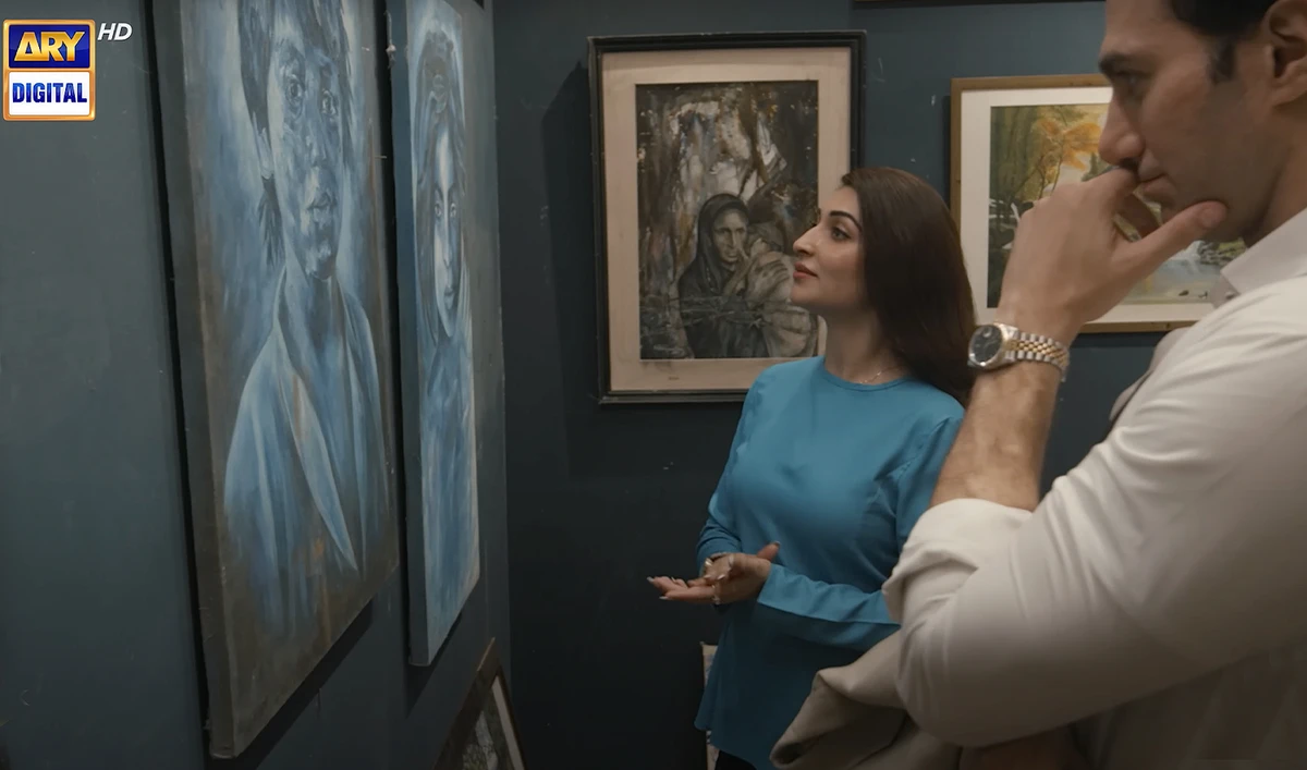 The screengrab taken on September 17, 2024, from a video uploaded by ARY Digital HD shows actors of a TV soap, “Kabhi Main Kabhi Tum,” looking at missing paintings of a Pakistani artist, Safdar Ali Soomro. (ARY Digital HD/Screengrab)
