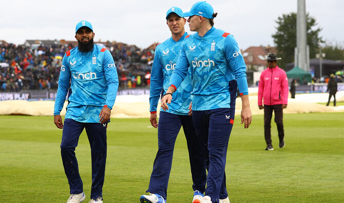 England's Adil Rashid, Matthew Potts, and Brydon Carse walk off the field as the rain stops playing England v Australia's fifth One Day International at Bristol County Ground in Bristol, Britain, on September 29, 2024. (REUTERS/File)